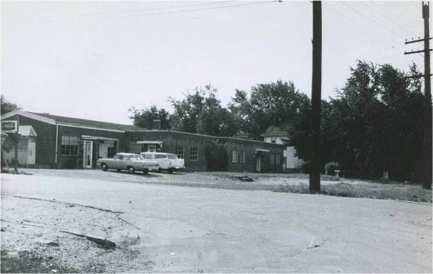 Black’s Store, shown here circa 1969, was owned by Charles Black.  It had four apartments, a dry cleaners, and a beauty parlor, along with a store that sold groceries and snacks. With a lunch counter and juke box, the establishment became a popular place for teens to gather, eat, dance, and enjoy being together.  